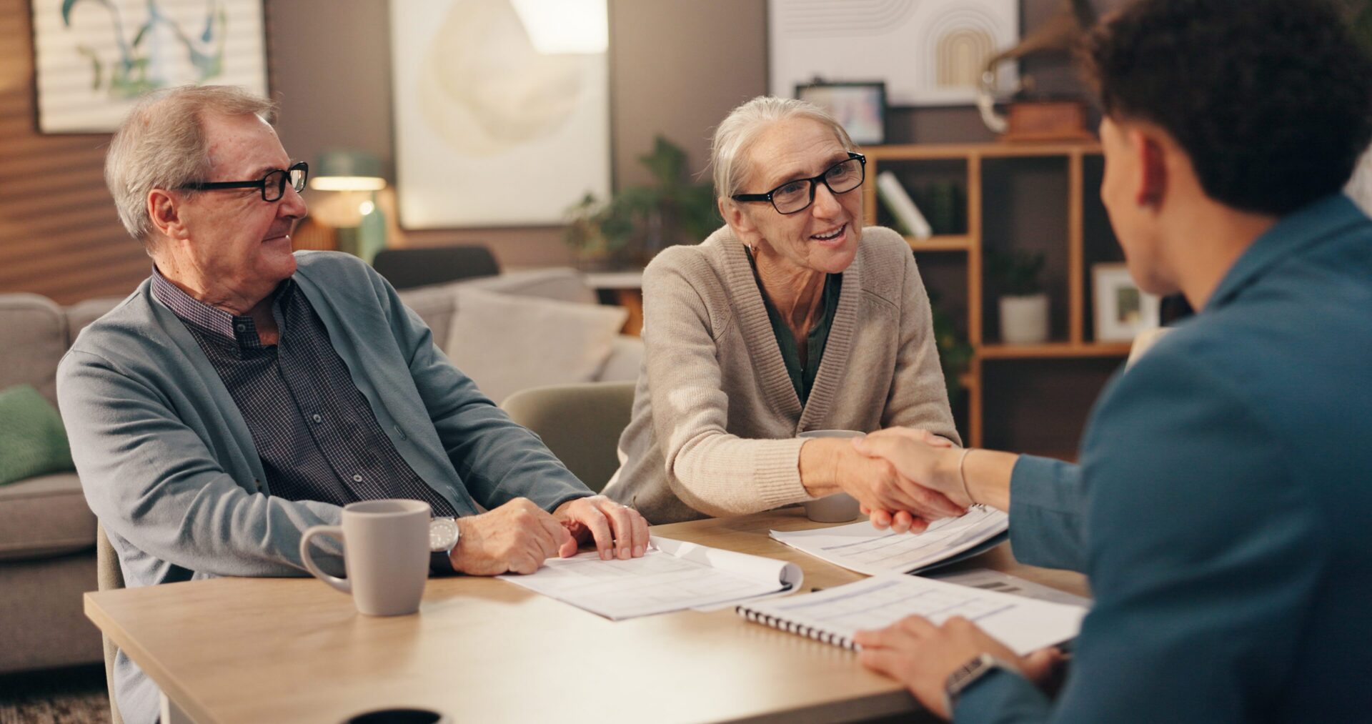 Elderly couple meeting with a professional.